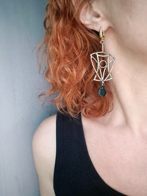 Asymmetrical brass earrings 