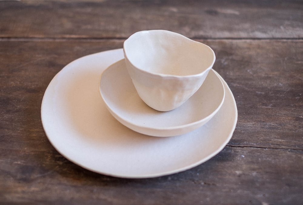 Image of Set comida blanco roto con textura