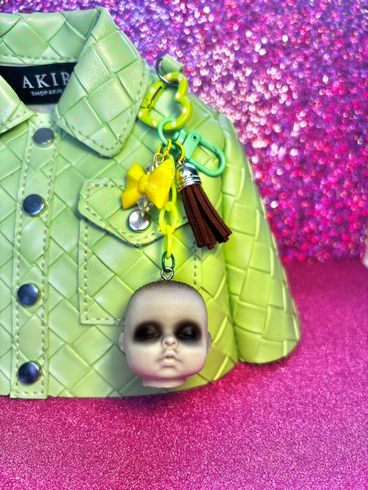 Image of Creepy Baby Doll Head Bag Charm Green