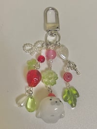 Image 3 of strawberry seal clay keychain