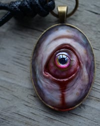 Image 13 of Color Shift Eye glow in the dark pendant OOAK