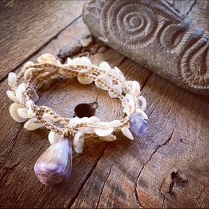 Image of Dainty Hawaiian puka shell wrap bracelet or necklace with a purple cone shell