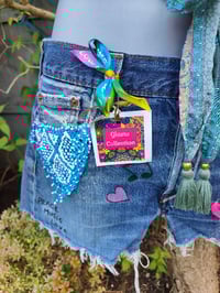 Image 1 of Vintage Levi 501 cut off shorts - waist 30 inches peace love music