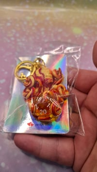 Yellow and orange octopus d20 keychain 