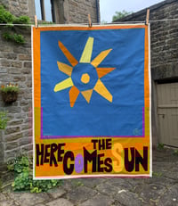 Image 1 of Here comes the Sun