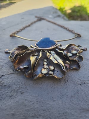 Blue stone and bullet cussings necklace 