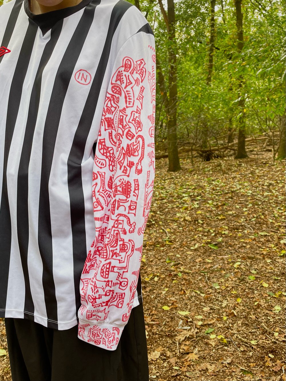 artsy striped football shirt