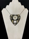 Juvenile black widow and bone oujia planchette pendant 