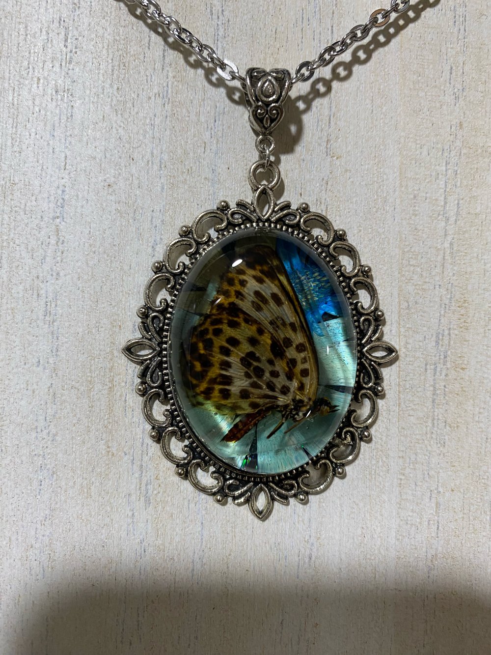 Blue floral butterfly cameo pendant 