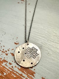 Image 18 of blue sapphire pendant with Fitzgerald quote