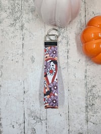 Image 1 of Retro Batty Flower Wristlet Keychain
