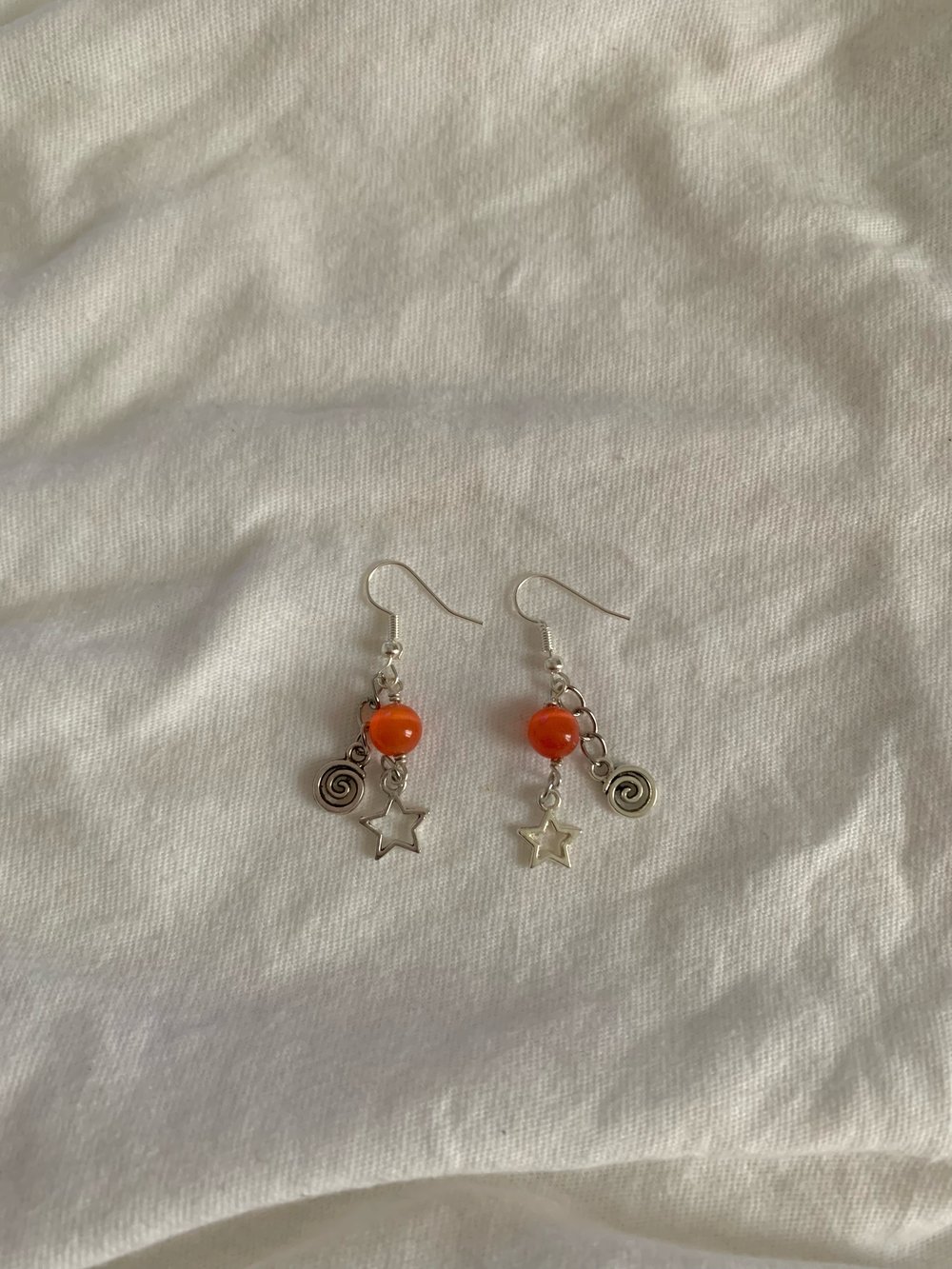 "swirly star" earrings 