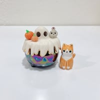 Image 1 of Glow in dark orange cat in witch brew cauldron ceramic keepsake (rainbow effect)