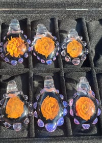 Gold fume flower pendant