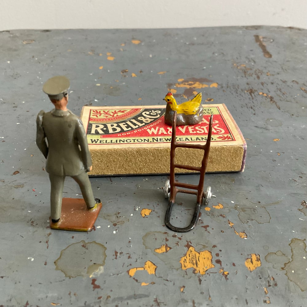 Image of Guy With Chook & Vesta Box