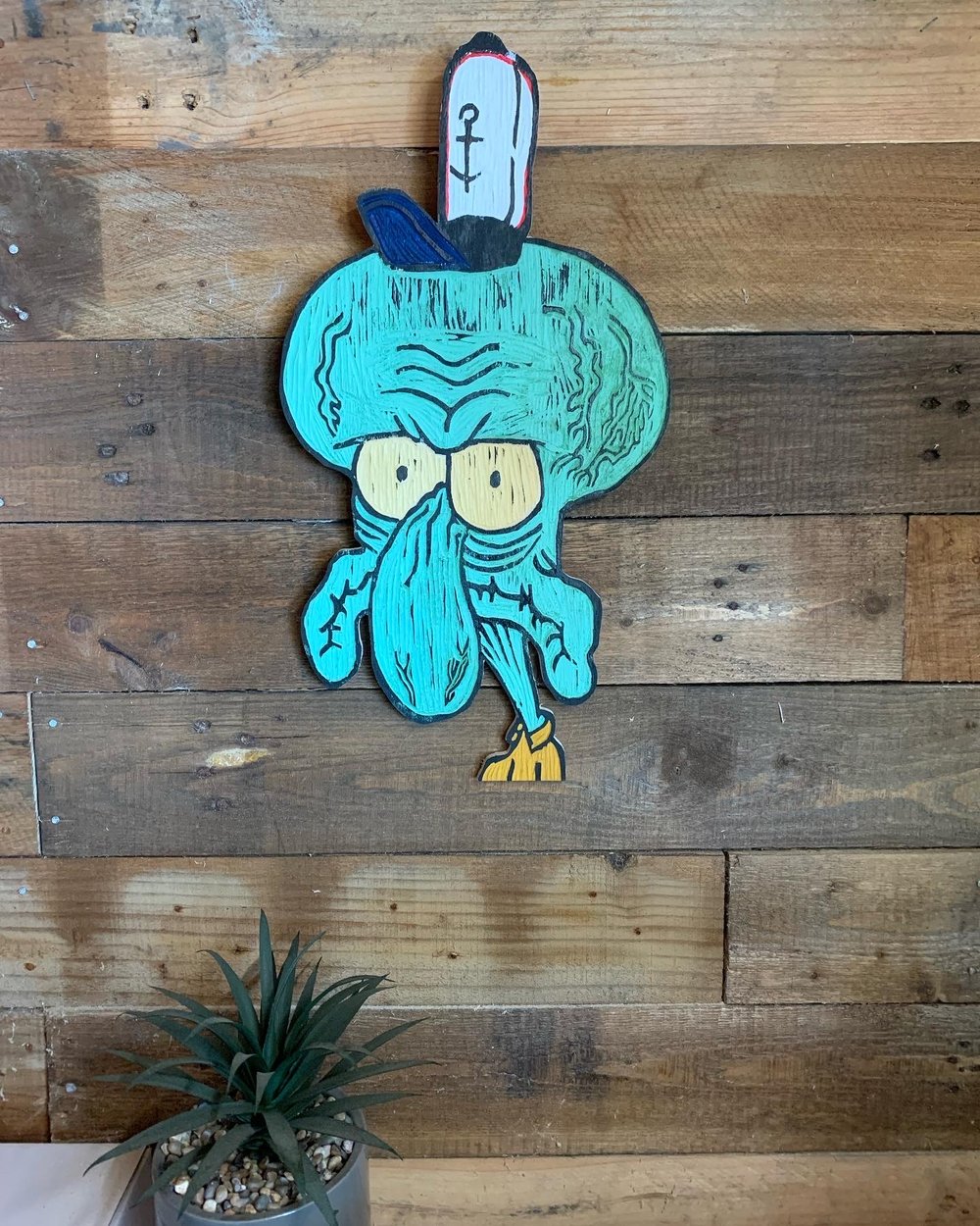 Angry Squidward meme carving