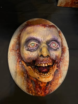 Image of Jaw Bone Johnny wall plaques