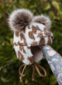 Image 1 of Leopard print teddy fleece trapper hat with pom poms
