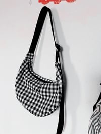 Image 2 of black and white crescent bags