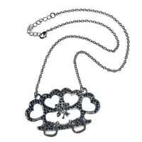 Image 1 of black brass knuckle bow heart necklace 