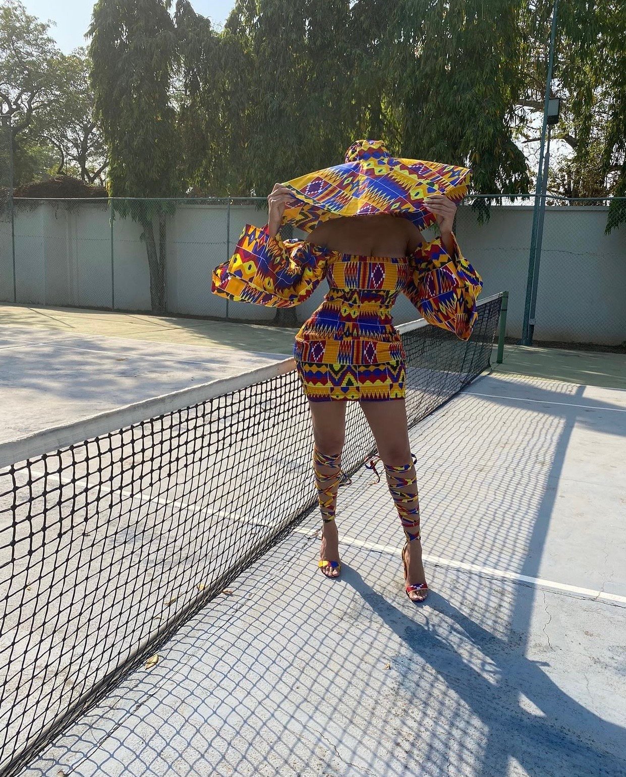 Image of 'KENTE' PRINTED ELASTIC DRESS WITH PUFF SLEEVES (MEDIUM)