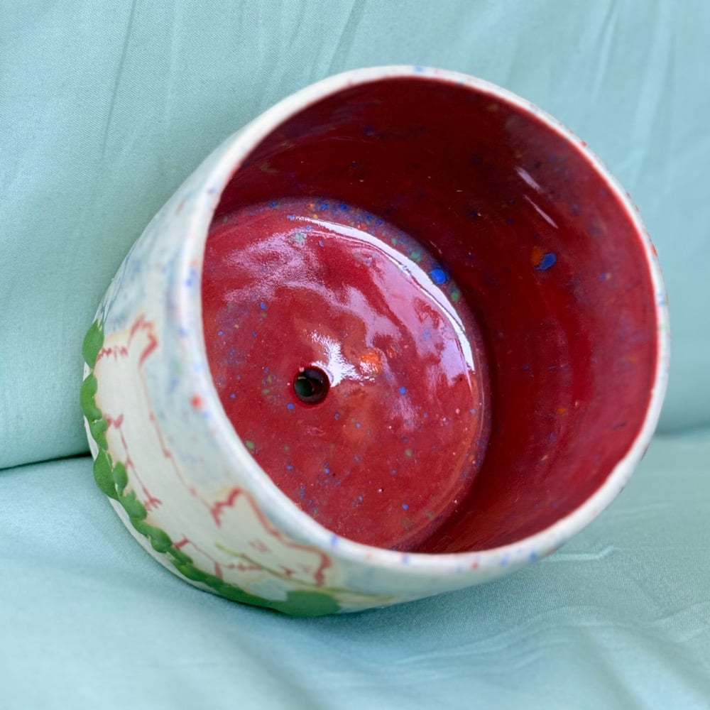 image of angry dog planter