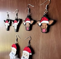 Image 2 of Cows w Santa Hats