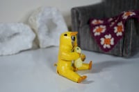 Image 2 of Sloth in a Ducky Onesie