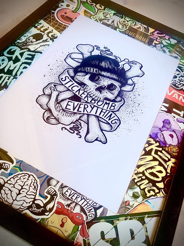 Image of Stickerbomed frame “skull print”