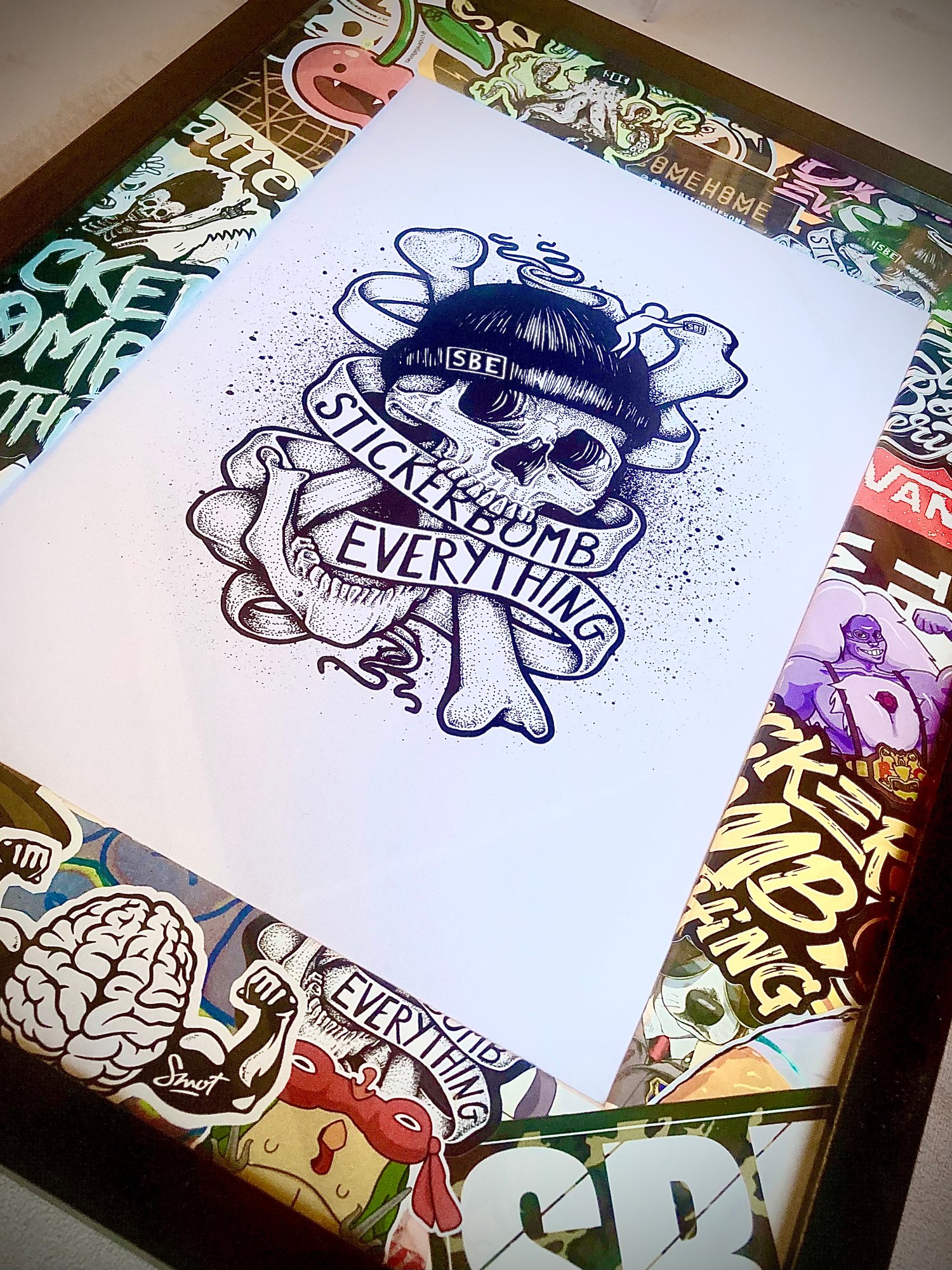 Image of Stickerbomed frame “skull print”