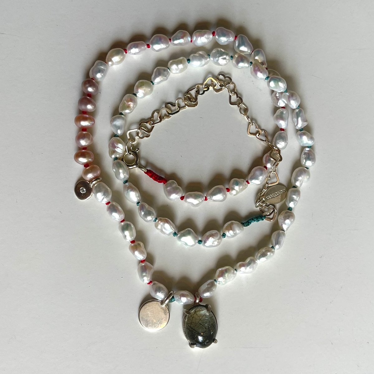 Image of pearl and three charm necklace