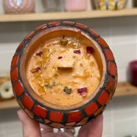 Image 3 of smoked pumpkin scented jack-o’-lantern candle
