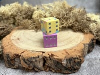 Image 4 of D6 Dice Pair Purple and Yellow with Star Pips