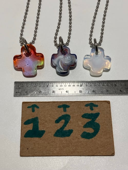 Image of plus pendants +