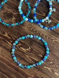 Image 7 of Star Shine Sea Glass Aura Blue and Teal Tumbler Bracelet Stack