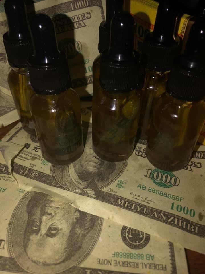 Image of Money Showers Abundance Oil 