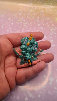 Teal resin baby dragon