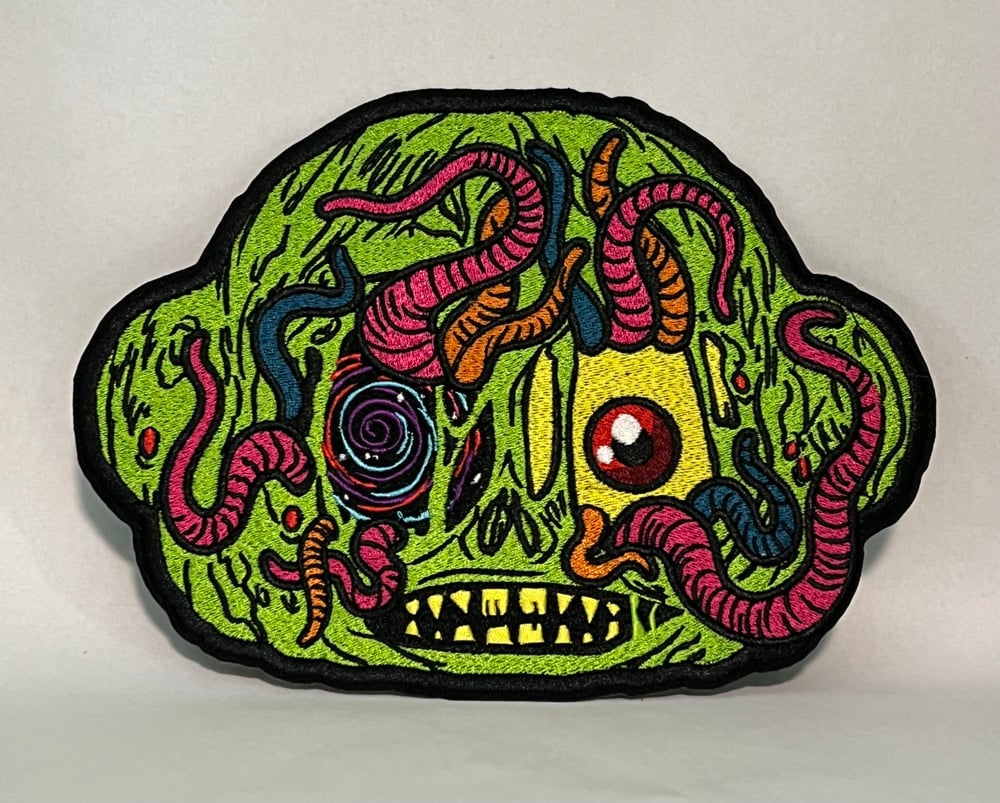 Zom vinyl figure and embroidered patch