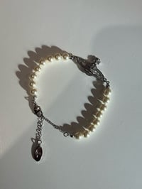 Image 1 of Silver orb pearl bracelet 