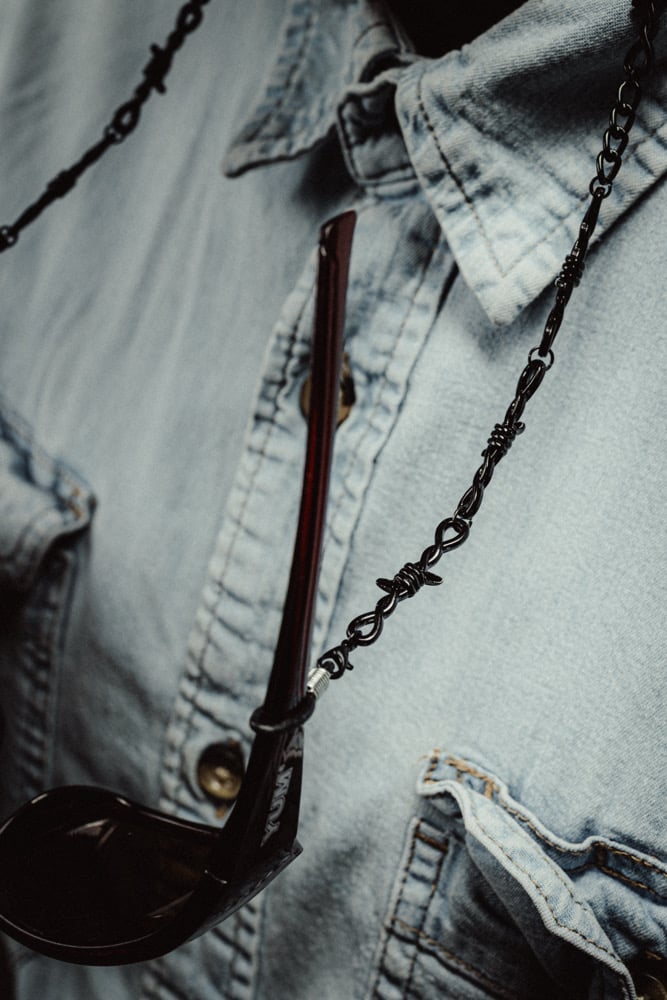 Image of black barbed wire