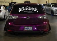 Murdaa members rear banner 