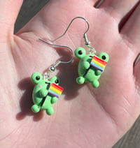 Image 2 of Pride flag frog earrings