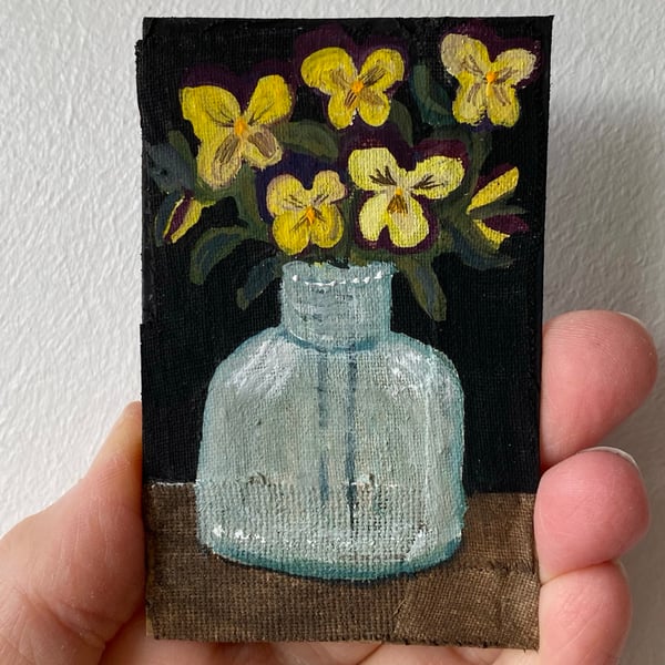 Image of cheerful violas in an antique bottle - tiny painting 