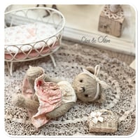 Image 1 of Handmade teddy bear wearing a pretty floral dress.