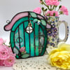 Teal and Pink Fairy Door suncatcher