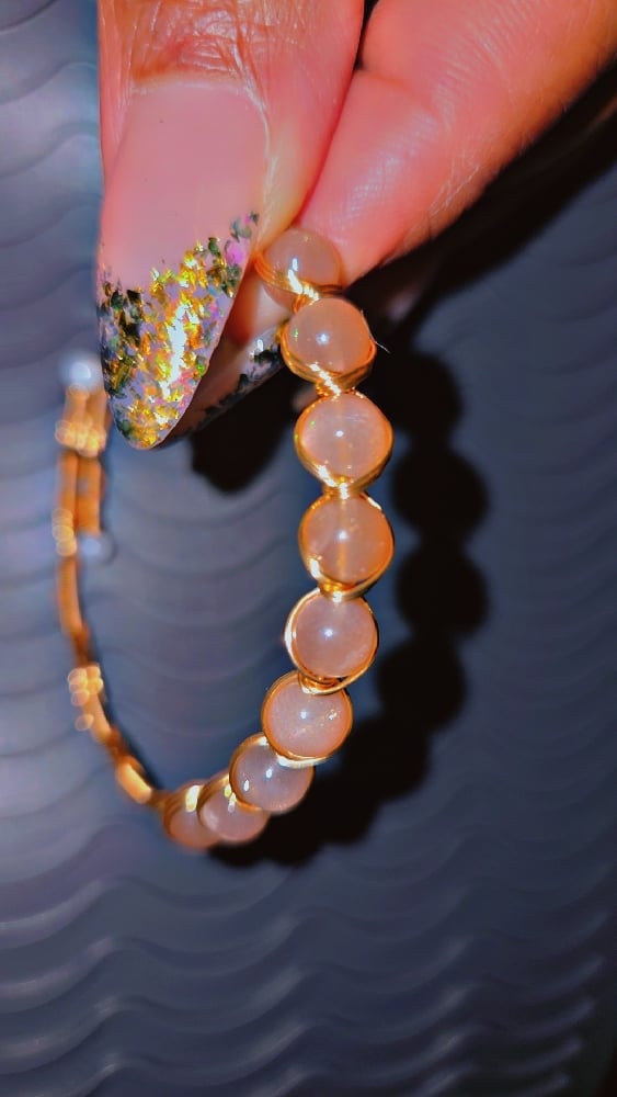 Image of peach moonstone bracelet
