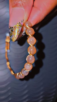 Image 1 of peach moonstone bracelet