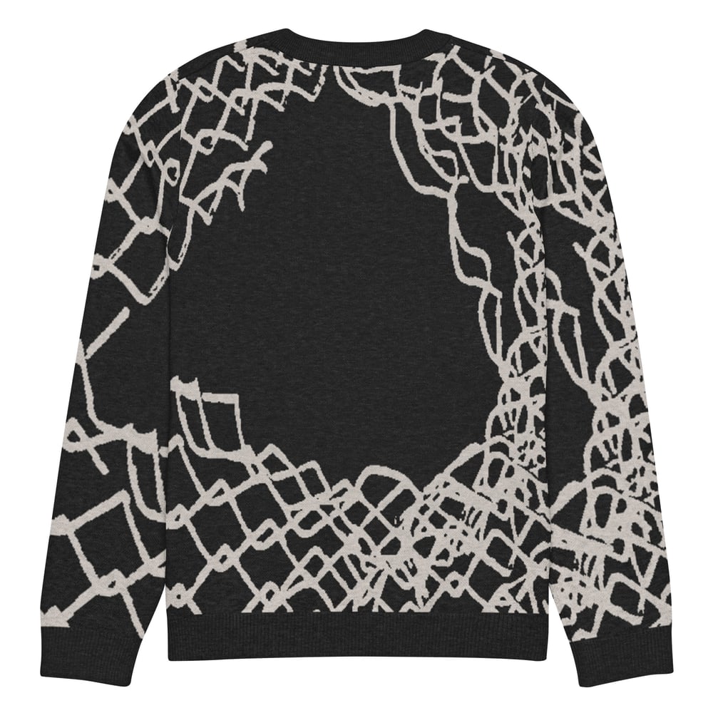 Hole in Knitted crew neck sweater