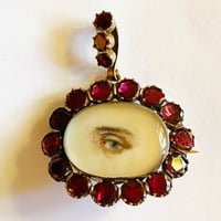 Image 1 of GARNET SET LOVER'S EYE PENDANT