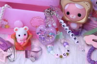 Image 1 of 'love cherry motion' LOONA keychain